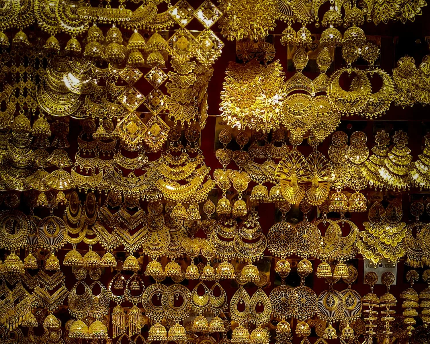 A wall of gold jewellery in the atelier